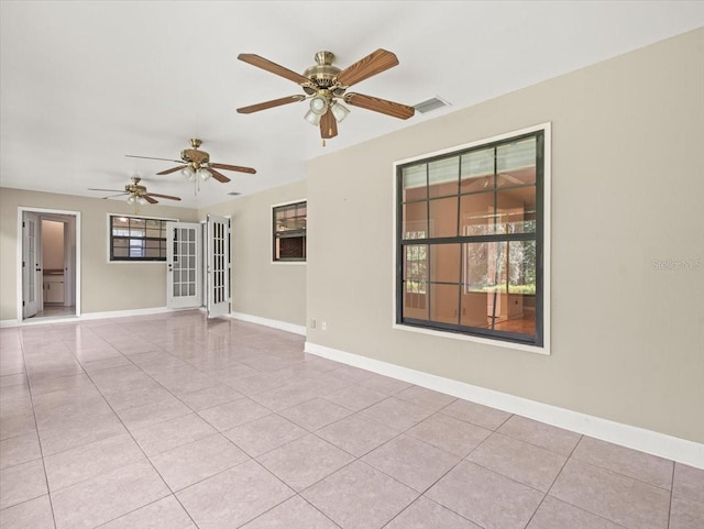1015 Hastings Ct, Lutz, FL 33548 - unfurnished room featuring light tile patterned floors and a ceiling fan