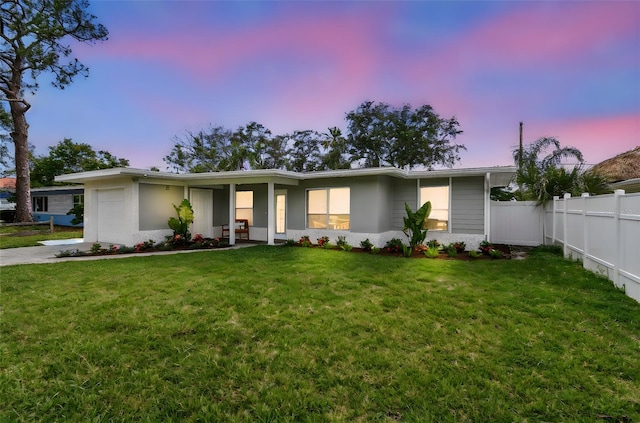 2452 Bayshore Blvd, Dunedin, FL 34698 - view of front of home featuring a garage and concrete driveway