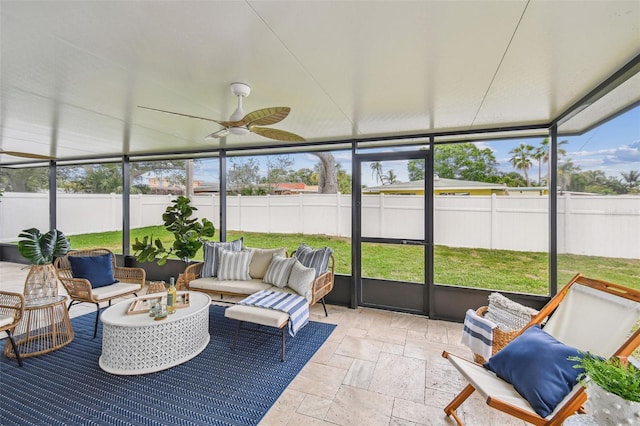 2452 Bayshore Blvd, Dunedin, FL 34698 - sunroom / solarium featuring a ceiling fan and outdoor lounge area