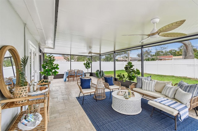 2452 Bayshore Blvd, Dunedin, FL 34698 - sunroom featuring ceiling fan, an outdoor living space, and outdoor dining space