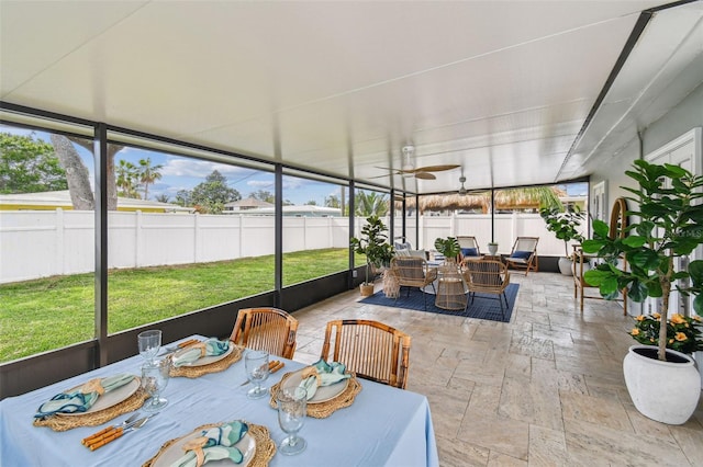 2452 Bayshore Blvd, Dunedin, FL 34698 - sunroom / solarium with outdoor dining area, healthy amount of natural light, and an outdoor hangout area