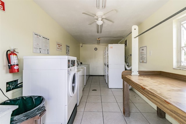 345 S Mcmullen Booth Rd Unit 142, Clearwater, FL 33759 - communal laundry room with independent washer and dryer, a ceiling fan, and light tile patterned floors
