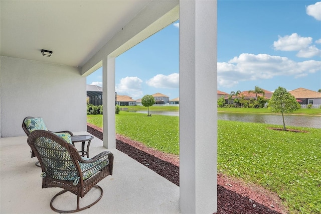 12004 Cinnamon Fern Dr, Riverview, FL 33579 - view of patio / terrace with a residential view and a water view