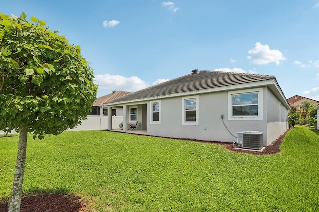 12004 Cinnamon Fern Dr, Riverview, FL 33579 - back of property with stucco siding, a patio area, and a tile roof