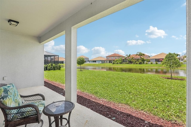 12004 Cinnamon Fern Dr, Riverview, FL 33579 - view of patio / terrace featuring a water view and a residential view