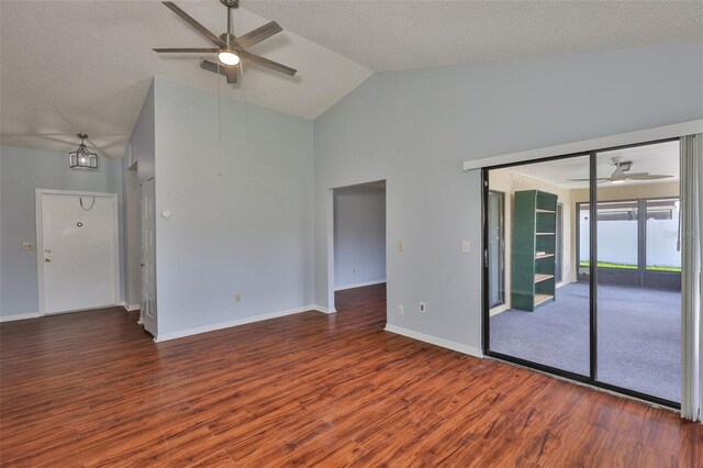 1717 Atrium Dr, Sun City Center, FL 33573 - spare room with a ceiling fan, wood finished floors, high vaulted ceiling, and a textured ceiling