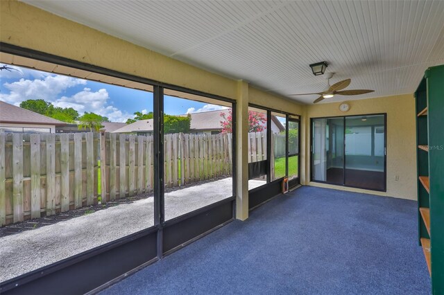 1717 Atrium Dr, Sun City Center, FL 33573 - unfurnished sunroom featuring a ceiling fan