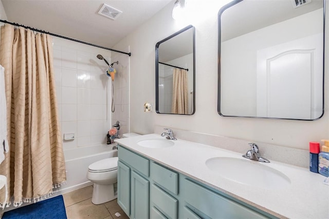 2073 Branding Iron Way, New Port Richey, FL 34655 - full bathroom featuring tile patterned floors, double vanity, and shower / tub combo with curtain