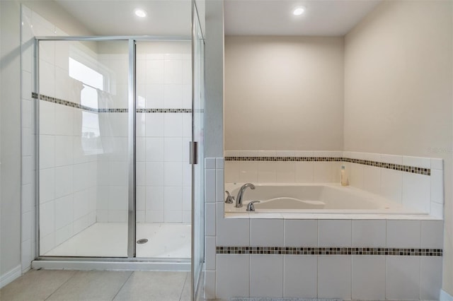2073 Branding Iron Way, New Port Richey, FL 34655 - full bath featuring tile patterned flooring, a garden tub, a shower stall, and recessed lighting