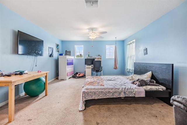 2073 Branding Iron Way, New Port Richey, FL 34655 - bedroom featuring carpet, an office area, and a ceiling fan