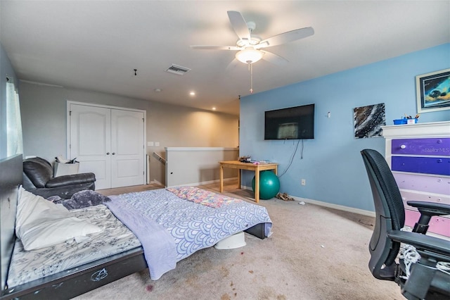 2073 Branding Iron Way, New Port Richey, FL 34655 - bedroom featuring a closet, carpet, and a ceiling fan