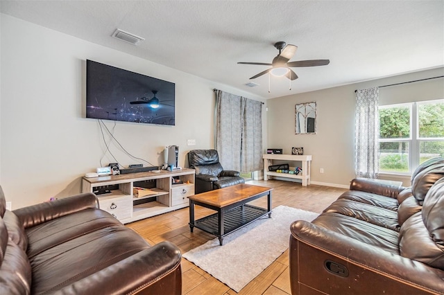 2073 Branding Iron Way, New Port Richey, FL 34655 - living room with ceiling fan and light wood finished floors
