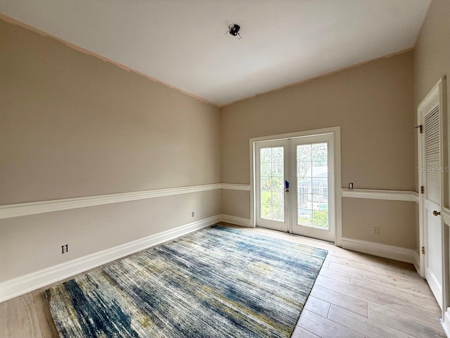 16006 Armistead Ln, Odessa, FL 33556 - unfurnished room featuring french doors and light wood finished floors