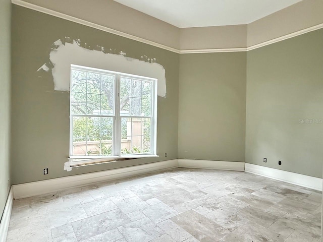16006 Armistead Ln, Odessa, FL 33556 - spare room with baseboards and stone tile floors