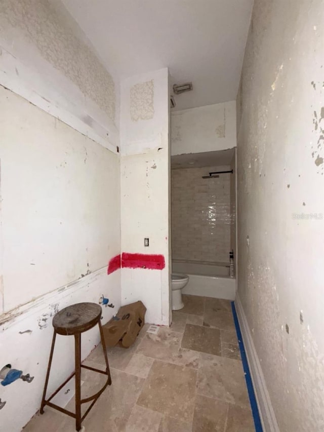 16006 Armistead Ln, Odessa, FL 33556 - bathroom featuring a shower and stone finish floors