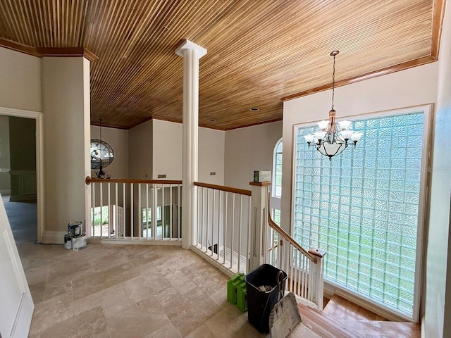16006 Armistead Ln, Odessa, FL 33556 - hallway with a chandelier, crown molding, wood ceiling, healthy amount of natural light, and an upstairs landing