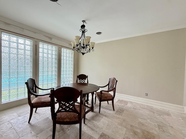 16006 Armistead Ln, Odessa, FL 33556 - dining room with stone tile flooring, ornamental molding, and a chandelier
