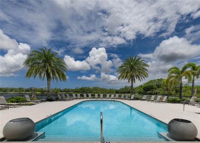 10520 Boardwalk Loop Unit 202, Bradenton, FL 34202 - community pool with a patio area