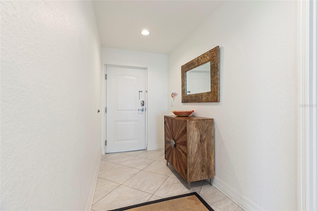 706 Bayway Blvd Unit 503, Clearwater, FL 33767 - hall featuring light tile patterned flooring and recessed lighting