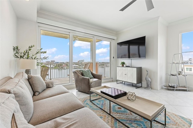706 Bayway Blvd Unit 503, Clearwater, FL 33767 - tiled living room with crown molding and a ceiling fan