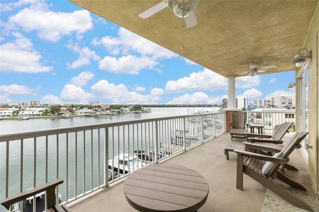 706 Bayway Blvd Unit 503, Clearwater, FL 33767 - balcony featuring ceiling fan and a water view
