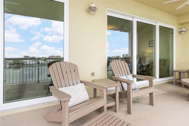 706 Bayway Blvd Unit 503, Clearwater, FL 33767 - view of patio / terrace featuring a ceiling fan and a water view