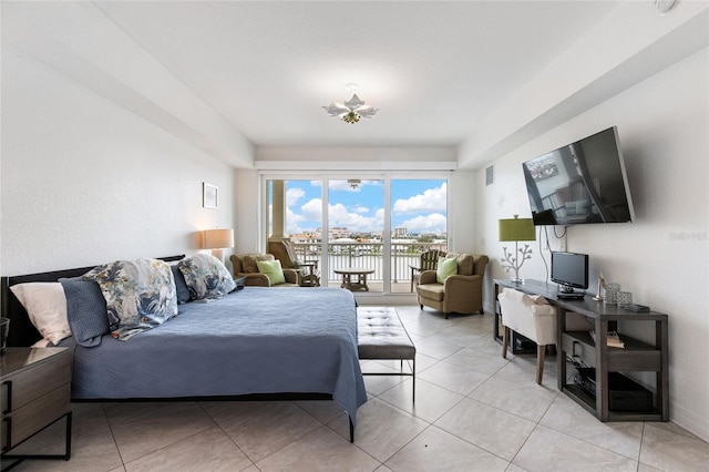 706 Bayway Blvd Unit 503, Clearwater, FL 33767 - bedroom with access to outside and light tile patterned floors