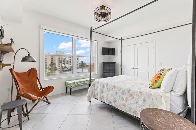 706 Bayway Blvd Unit 503, Clearwater, FL 33767 - bedroom featuring a closet and light tile patterned floors