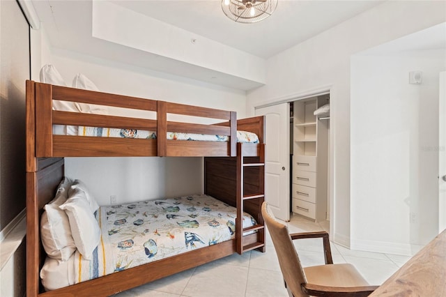 706 Bayway Blvd Unit 503, Clearwater, FL 33767 - bedroom featuring light tile patterned floors and a closet