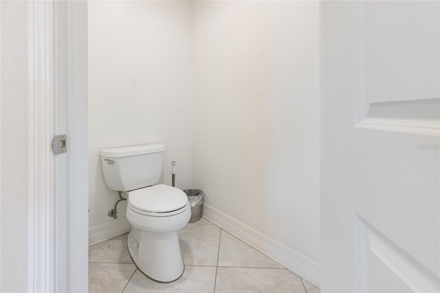 706 Bayway Blvd Unit 503, Clearwater, FL 33767 - bathroom featuring toilet and tile patterned floors
