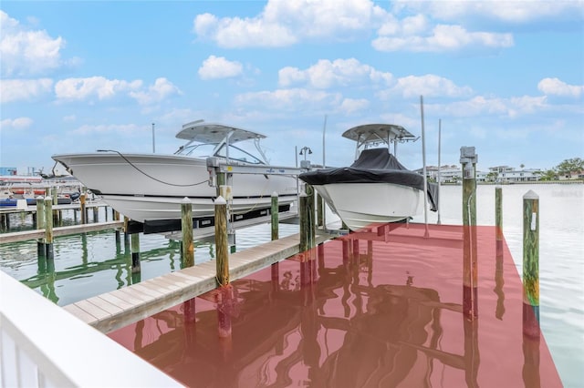 706 Bayway Blvd Unit 503, Clearwater, FL 33767 - dock area with boat lift and a water view