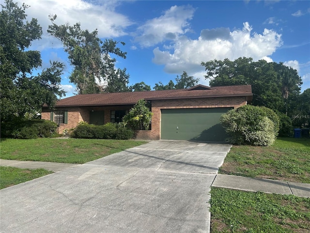 1813 Laurel Oak Dr, Valrico, FL 33596 - ranch-style house with brick siding, a garage, a front lawn, and concrete driveway
