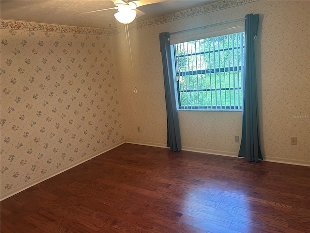 1813 Laurel Oak Dr, Valrico, FL 33596 - spare room featuring dark wood-style flooring and ceiling fan