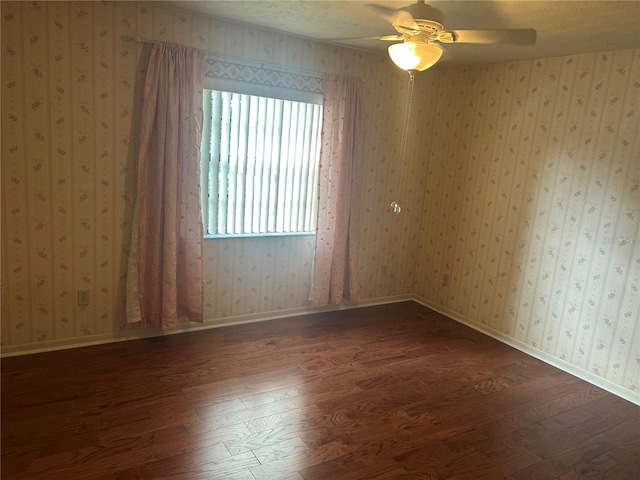 1813 Laurel Oak Dr, Valrico, FL 33596 - spare room with dark wood-style flooring and a ceiling fan