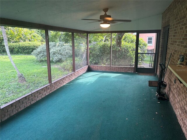 1813 Laurel Oak Dr, Valrico, FL 33596 - unfurnished sunroom featuring a ceiling fan