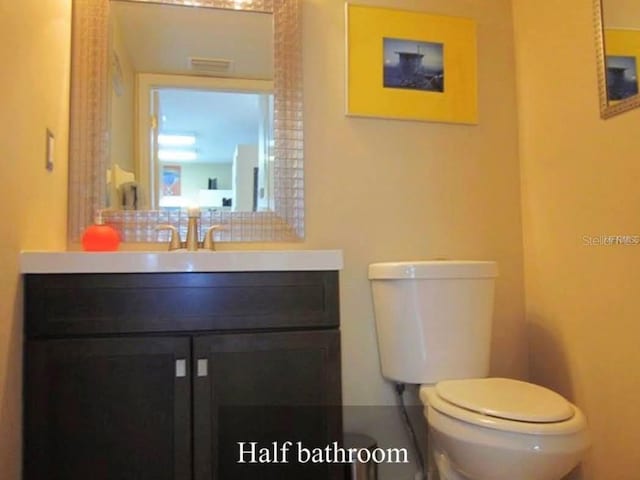 5139 Corvette Dr, Tampa, FL 33624 - half bathroom with toilet and vanity
