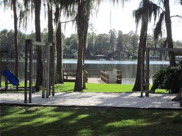 5139 Corvette Dr, Tampa, FL 33624 - view of home's community with a water view and a yard