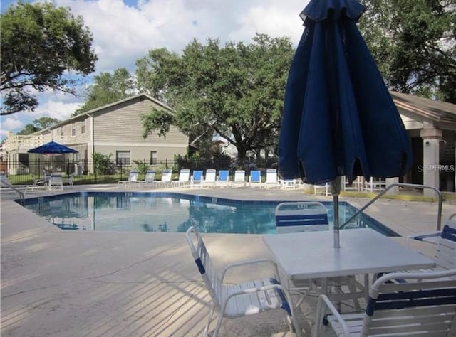 5139 Corvette Dr, Tampa, FL 33624 - community pool featuring a patio area