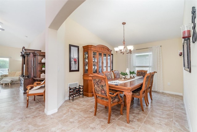 13194 Royal Pines Ave, Riverview, FL 33579 - dining area featuring vaulted ceiling, a chandelier, arched walkways, and light tile patterned floors
