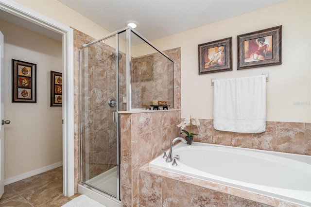 13194 Royal Pines Ave, Riverview, FL 33579 - bathroom featuring a bath and a stall shower