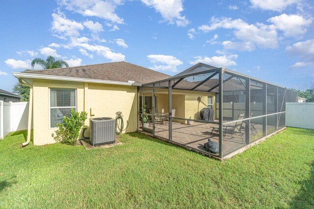 13194 Royal Pines Ave, Riverview, FL 33579 - back of house with a patio, stucco siding, glass enclosure, and a shingled roof