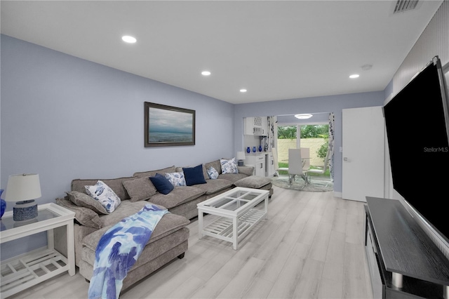 1701 Pinehurst Rd Unit 33E, Dunedin, FL 34698 - living area with recessed lighting and light wood-style floors