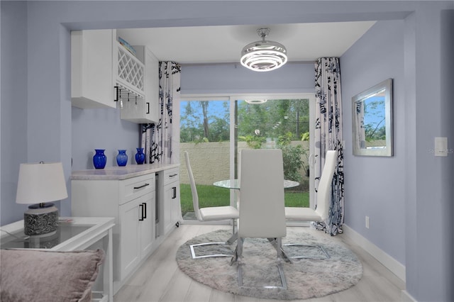 1701 Pinehurst Rd Unit 33E, Dunedin, FL 34698 - dining room featuring plenty of natural light