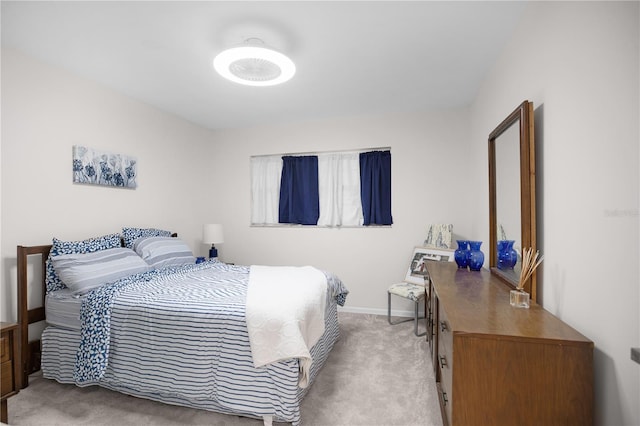 1701 Pinehurst Rd Unit 33E, Dunedin, FL 34698 - bedroom featuring carpet floors and baseboards