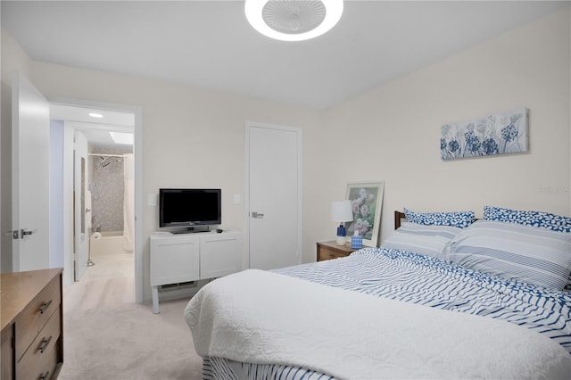 1701 Pinehurst Rd Unit 33E, Dunedin, FL 34698 - bedroom featuring light carpet, recessed lighting, and ensuite bathroom