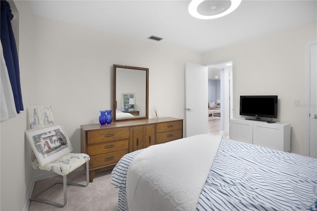 1701 Pinehurst Rd Unit 33E, Dunedin, FL 34698 - bedroom featuring light colored carpet