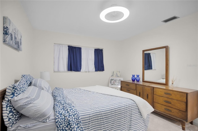 1701 Pinehurst Rd Unit 33E, Dunedin, FL 34698 - bedroom featuring light colored carpet