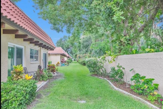 1701 Pinehurst Rd Unit 33E, Dunedin, FL 34698 - view of fenced backyard