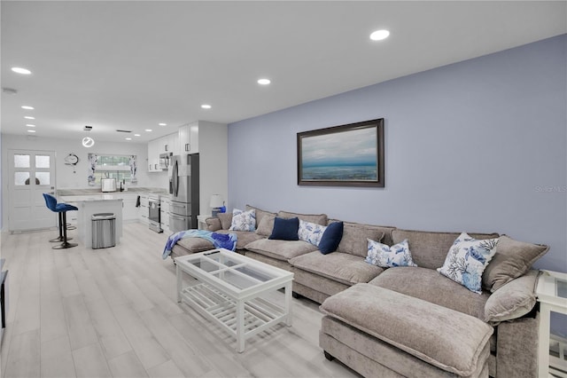 1701 Pinehurst Rd Unit 33E, Dunedin, FL 34698 - living area with recessed lighting and light wood-style floors
