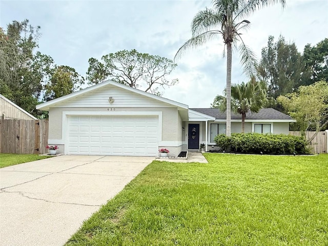 630 Timber Bay Cir W, Oldsmar, FL 34677 - ranch-style home featuring driveway, an attached garage, and stucco siding
